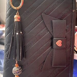 Black leather tassel purse charm